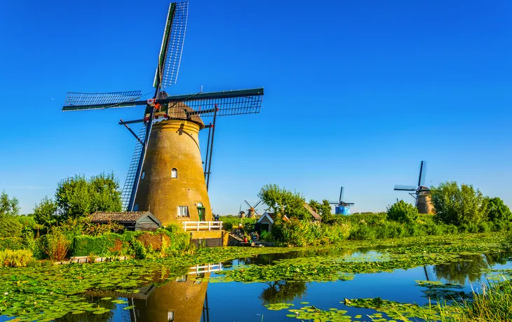 Kinderdijk windmills viewed during sunny summer day, Rotterdam, Netherlands